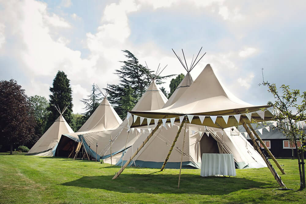 Teepees set up for a beautiful humanistic 1920s wedding in Henfield Sussex.